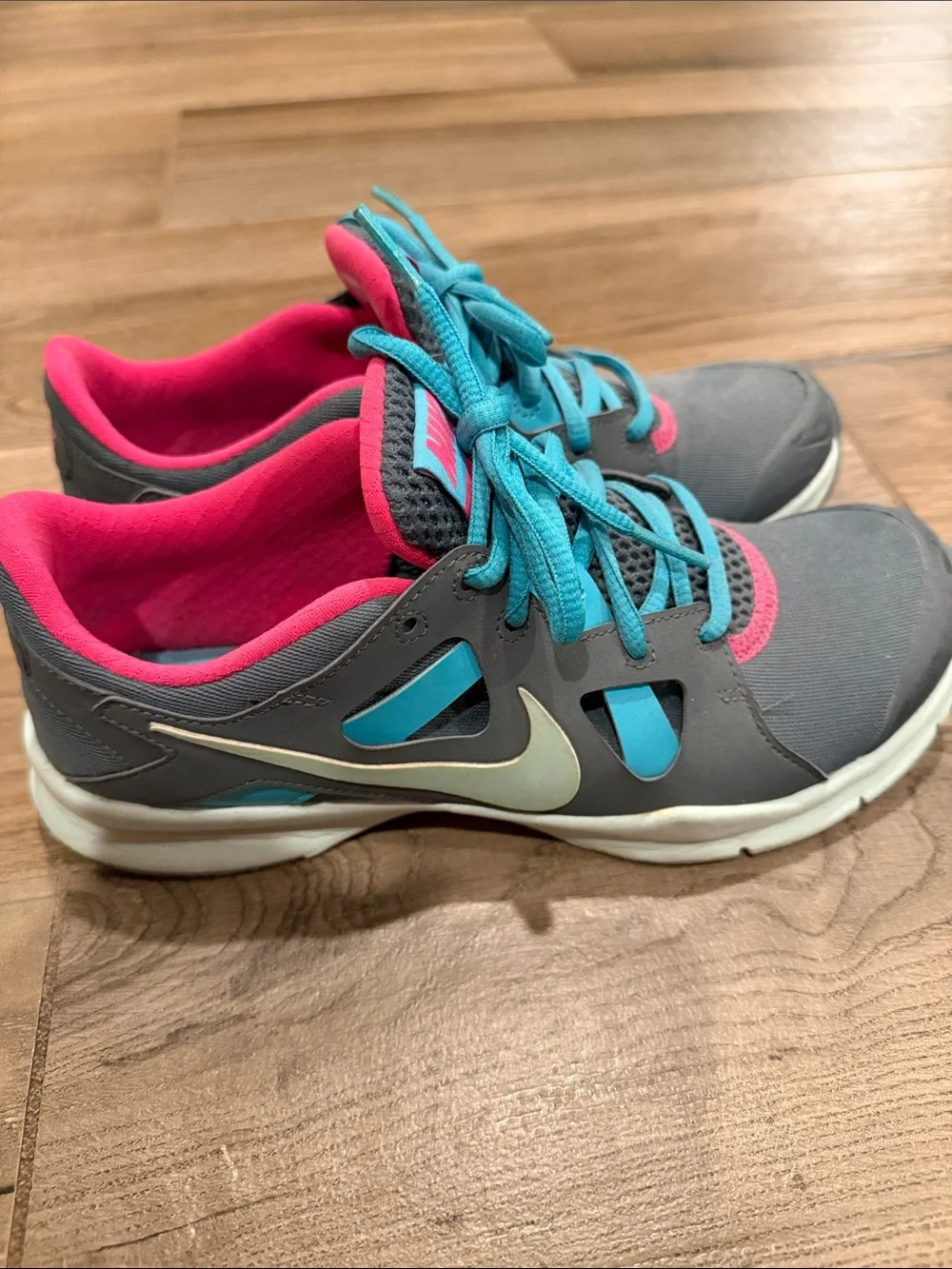 Nike Women's Gray Athletic Sneakers with Teal Laces and Pink Interior